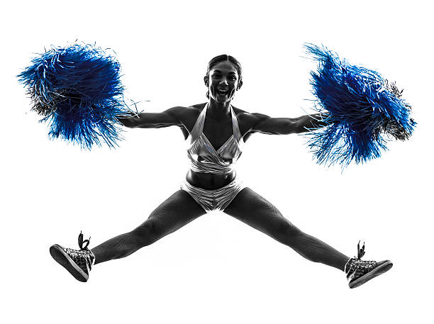 istock young woman cheerleader cheerleading  silhouette 513601291