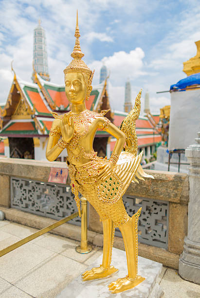 Kinnari statue at Wat Phra Kaew stock photo