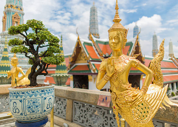 Kinnari statue at Wat Phra Kaew stock photo
