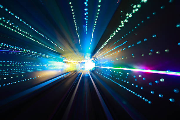 istock Through the long of lighting tunnel 513601856