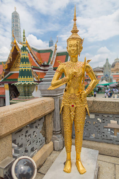Kinnari statue at Wat Phra Kaew stock photo