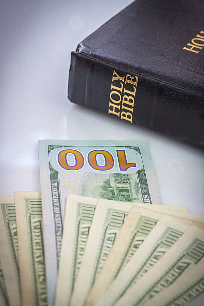 istock Holy Bible and money 513602125