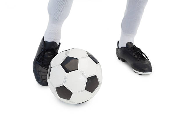 istock Football player standing with the ball 513606509