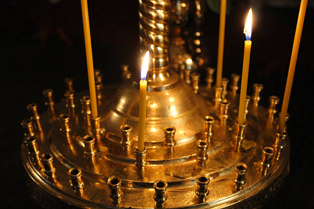 istock church candles brightly burning 513623196