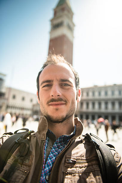 istock tourist doing selfie in venice 513623878