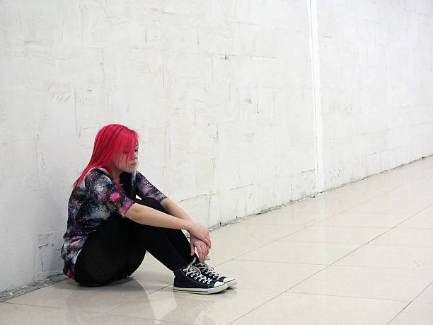 Sad girl sitting on the floor individuality,sadness,depression,teen,girl black hair emo girl stock pictures, royalty-free photos & images