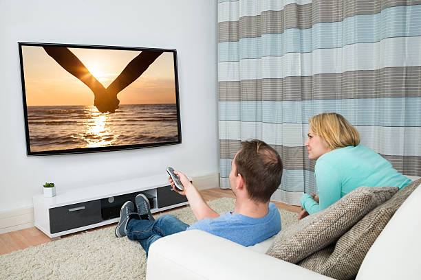 istock Couple Watching Film Together 513626732