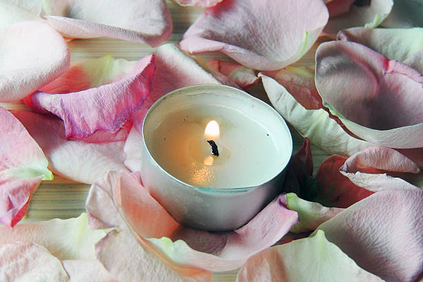 istock Petals of roses and candles 513628344