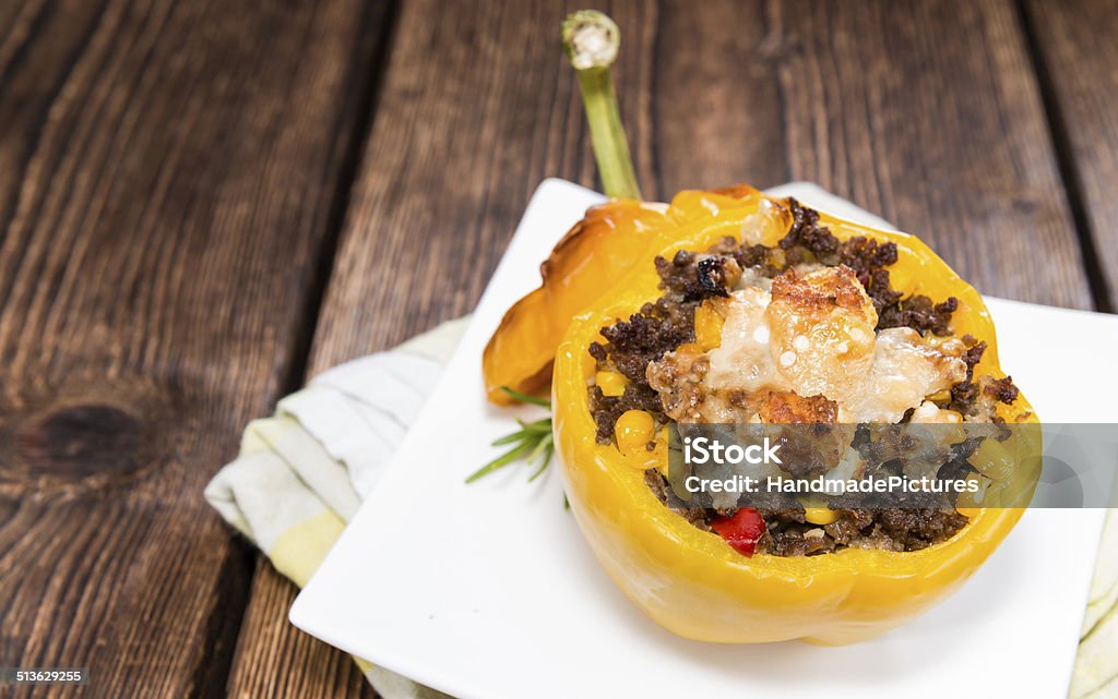Stuffed Peppers Stuffed Peppers with minced meat (beef), cheese and fresh herbs Appetizer Stock Photo