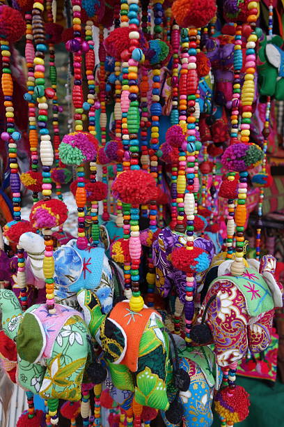 istock Colorful hanging mobile made from fabric, yarn, and beads 513629416