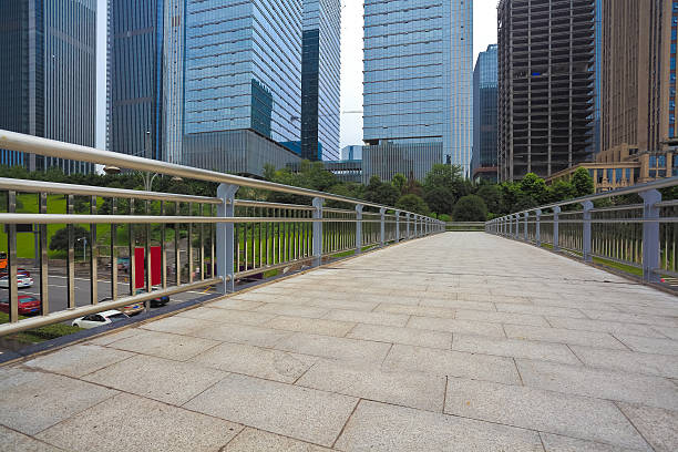 istock Empty road surface with modern city buildings background 513629742