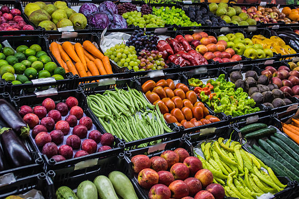 istock Mixed fruits and vegetables at organic fair 513630936