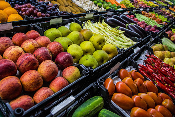 istock Mixed fruits and vegetables at organic fair 513631074