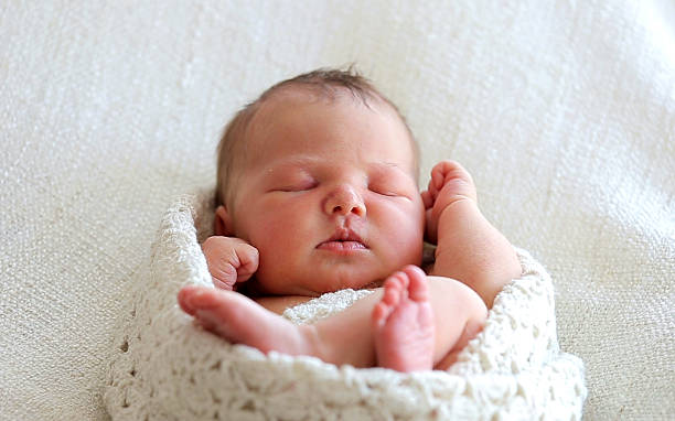 istock Portrait Sleeping Newborn Baby 513631638