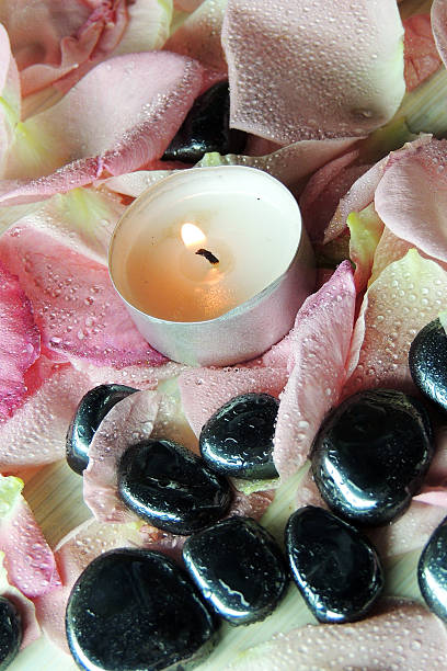 istock Petals of roses and candles 513631786