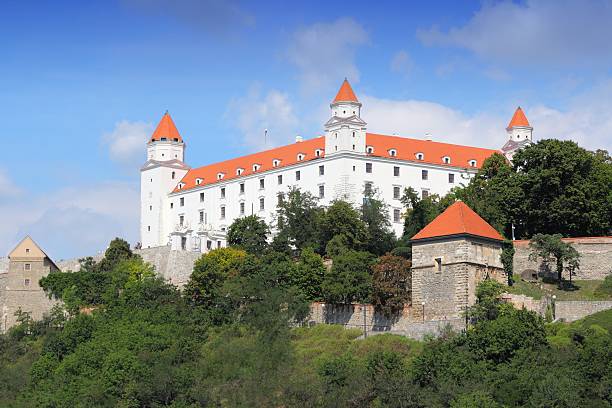 Bratislava Bratislava, Slovakia - August 9, 2012: Exterior view of the castle in Bratislava. Originally built in 9th century - 18th century, but it was reconstructed in 1956-1964. bratislava castle bratislava castle fort stock pictures, royalty-free photos & images
