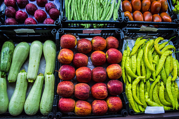 istock Mixed fruits and vegetables at organic fair 513632072