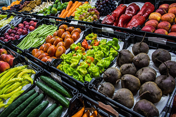 istock Mixed fruits and vegetables at organic fair 513632232