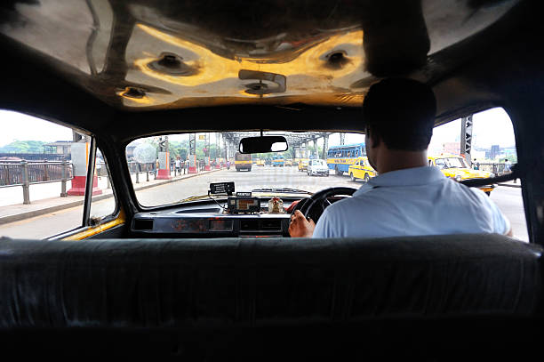 Kolkata, India - October 6, 2013: view seen from the cab on the street of Kolkata, a super large city in the  West Bengal, India.