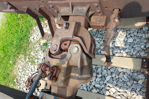 Rusty of train car hook coupler.