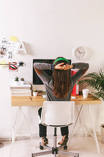 istock Young creative woman relaxing at office. 513633437
