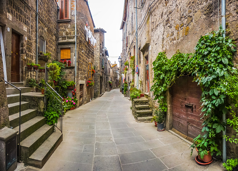 Beautiful view of old traditional houses and idyllic alleyway in the historic town of Vitorchiano, province of Viterbo, Lazio, Italy