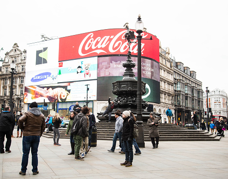London, UK - February 27, 2016: Piccadilly Circus, showing the digital advertising panels behind the bronze statue of Cupid