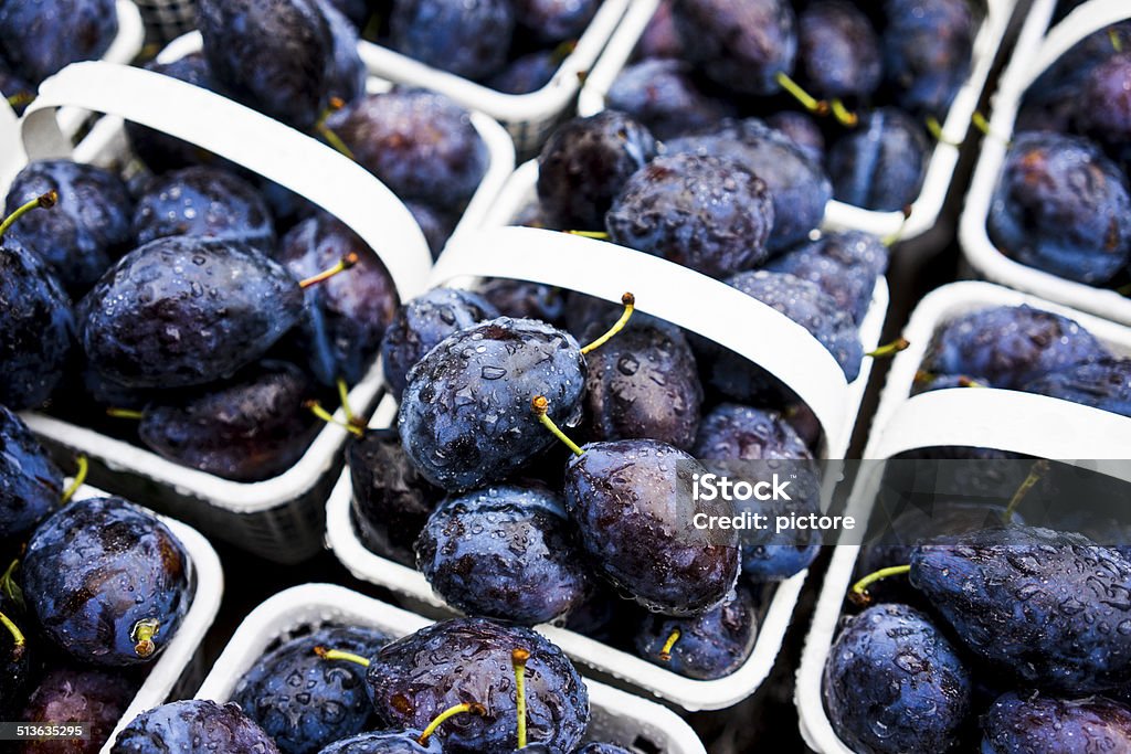 Fresh plums Fresh plums in the market. Basket Stock Photo