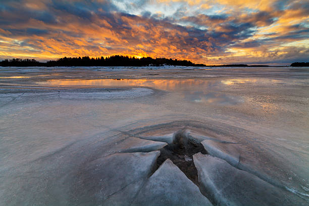 istock Beautiful winter evening on the icy river. 513636042