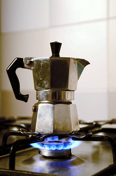 istock Italian vintage coffeepot on kitchen stove 513637810