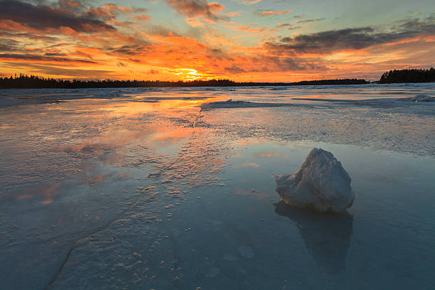 istock Beautiful winter evening on the icy river. 513638220