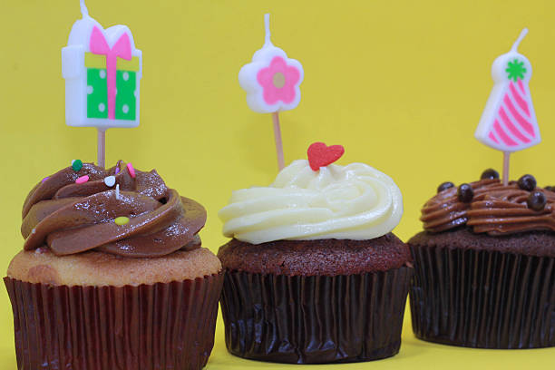 Cute cupcakes in a yellow background