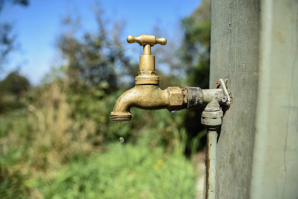 istock Dripping Garden Faucet 513640216