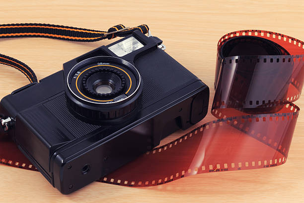 istock Old camera, vintage camera films popular in the past. 513640430