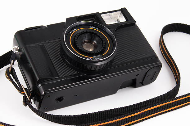 istock Old camera, vintage camera films popular in the past. 513641224