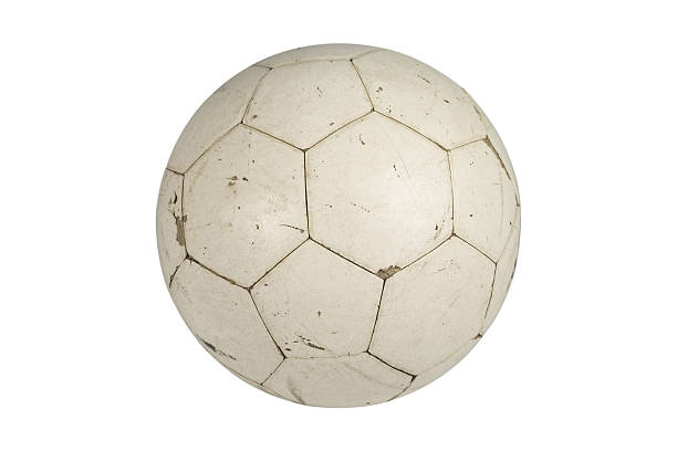 Old soccer ball isolated on white stock photo