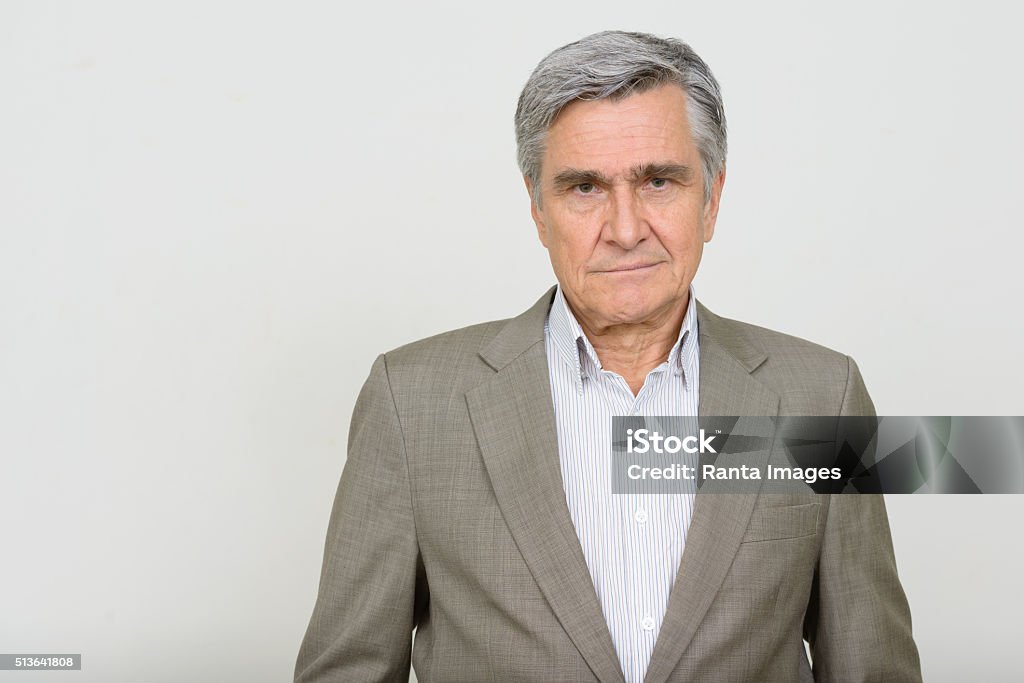 Portrait Of Senior Businessman Portrait of Caucasian senior businessman horizontal studio shot 60-64 Years Stock Photo