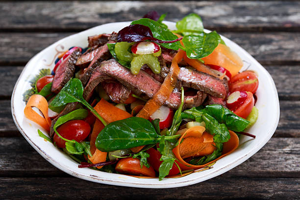 istock Spicy Beef Meat Salad with mixed vegetables 513643658