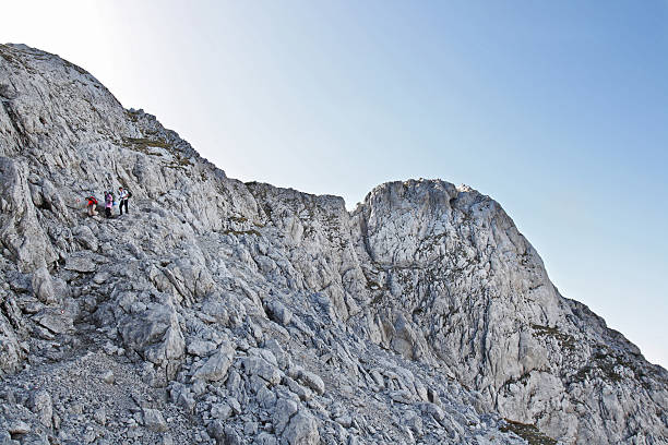 istock Group of hikers descent from mountain 513646092