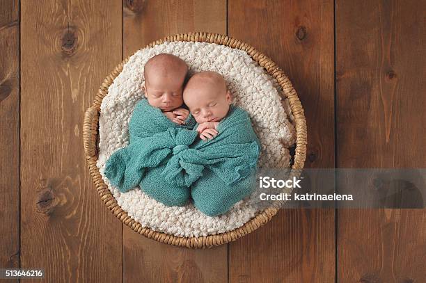 Twin Baby Boys Sleeping In A Basket Stock Photo - Download Image Now - Baby - Human Age, Twin, Babies Only