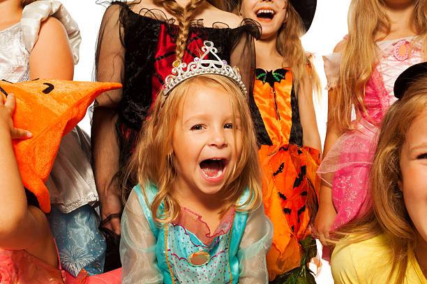 istock Girl in Halloween costume isolated on white 513647675