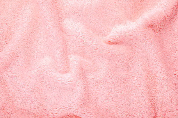 istock soft pink texture of bath towel folded as a background 513650045