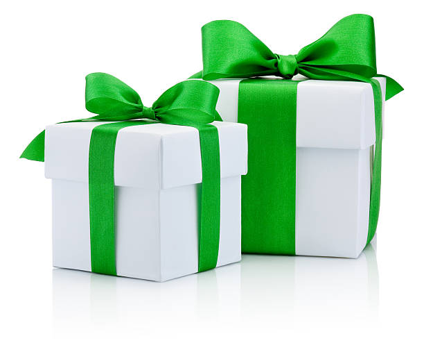 istock Two White boxs tied green ribbon bow Isolated on white 513650445