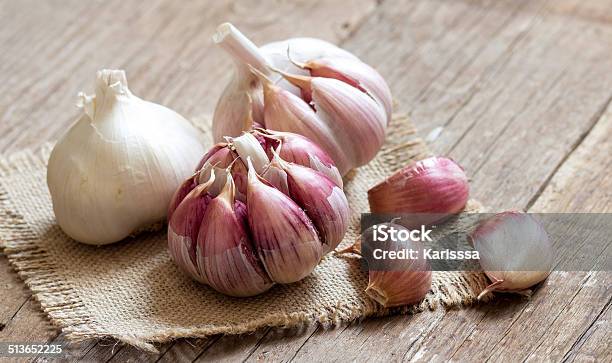 Fresh Garlic On Wooden Background Stock Photo - Download Image Now - Garlic, Organic, Garlic Clove