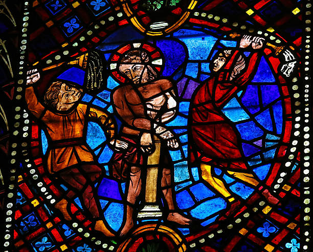 Torture of Jesus Stained glass window depicting Jesus being tortured on Good Friday, in the cathedral of Leon, Castille and Leon, Spain. This window is more than 400 years old, no property release is required. whip tortured punishment cruel stock pictures, royalty-free photos & images