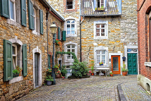 istock Small cobblestone street in old town 513653503