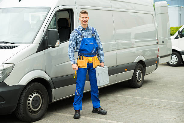 istock Repairman With Tools And Toolbox In Front Of Van 513671084