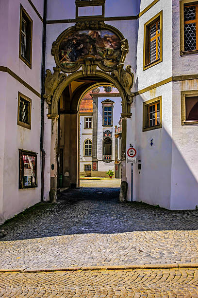 Baroque Benedictine abbey entrance in Fussen, Germany Fussen, Germany - June 30, 2012: Main entrance into the Baroque Benedictine abbey courtyard in Fussen, Germany st mang stock pictures, royalty-free photos & images