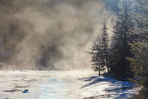 istock Beautiful winter mountain landscape with frozen river. 513677448