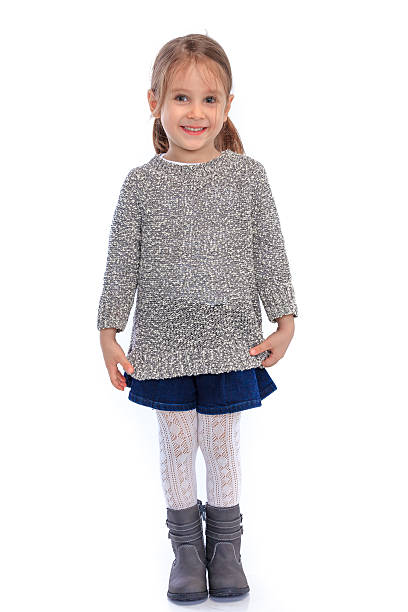 istock Little girl posing like a model with hands on hips. 513680122